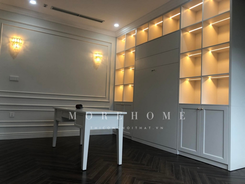 . Thi công một kệ tủ gỗ tự nhiên màu trắng, đèn leb trang trí để tạo nên sự gọn gàng, thẩm mỹ cao cho không gian và trưng bày, sắp xếp các món đồ.